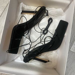 GOOD AMERICAN lace up black sandals